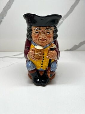 Royal Doulton Toby Jug in Black, Yellow, Burgundy and Blue